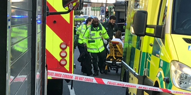 Emergency personnel attend to a person after an incident at Parsons Green underground station in London, Britain, September 15, 2017. REUTERS/Yann Tessier