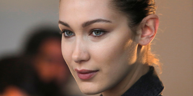 Model Bella Hadid waits backstage before the Michael Kors Autumn/Winter 2017 collection presentation during New York Fashion Week in the Manhattan borough of New York, U.S., February 15, 2017. REUTERS/Andrew Kelly