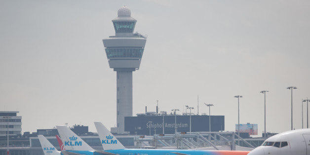 Passenger aircraft operated by KLM, the Dutch arm of Air France-KLM Group, stand at boarding gates at Schiphol airport in Amsterdam, Netherlands, on Tuesday, Aug. 15, 2017. Delta Air Lines Inc., China Eastern Airlines Corp. and Air France-KLM Group are reaching for their checkbooks to forge a deeper global alliance. Photographer: Jasper Juinen/Bloomberg via Getty Images