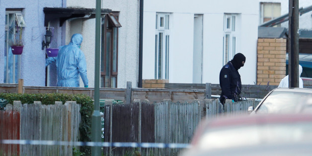 Investigators leave a property being searched after a man was arrested in connection with an explosion on a London Underground train, in Sunbury-on-Thames, Britain, September 16, 2017. REUTERS/Peter Nicholls