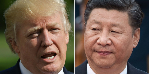 (COMBO) This combination of file photos created on September 18, 2017 shows US President Donald Trump speaking about Hurricane Irma upon in Washington, DC on September 10, 2017 and a photo taken on September 13, 2017 showing Chinese President Xi Jinping during a welcome ceremony outside the Great Hall of the People during a welcome ceremony for Sultan of Brunei Hassanal Bolkiah (not seen) in Beijing.
US President Donald Trump and his Chinese counterpart Xi Jinping committed to 'maximizing pressure on North Korea', the White House said September 18, 2017, amid an escalating crisis over Pyongyang's ballistic and nuclear weapons programs. In a phone call the two men discussed 'North Korea's continued defiance of the international community and its efforts to destabilize Northeast Asia,' the White House said.
/ AFP PHOTO / MANDEL NGAN AND NICOLAS ASFOURI (Photo credit should read MANDEL NGAN,NICOLAS ASFOURI/AFP/Getty Images)