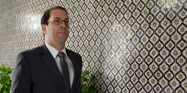 Tunisian Prime Minister Youssef Chahed arrives at his office for an interview with AFP journalists on November 8, 2016 in Tunis.
The Tunisian prime minister heads to Paris on November 9 in a bid to drum up French investment in the struggling economy of its former North African colony. Chahed, 41, will meet his counterpart Manuel Valls and President Francois Hollande during the 'strategic' visit. / AFP / FETHI BELAID (Photo credit should read FETHI BELAID/AFP/Getty Images)