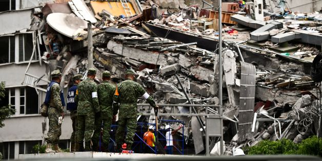Rescuers search for survivors amid the rubble from a building flattened by the 7.1-magnitude quake the day before, in Mexico City, on September 20, 2019.
Rescuers frantically searched Wednesday for survivors of a powerful earthquake that killed more than 200 people in Mexico on the anniversary of another massive quake that left thousands dead and still haunts the country. / AFP PHOTO / RONALDO SCHEMIDT (Photo credit should read RONALDO SCHEMIDT/AFP/Getty Images)