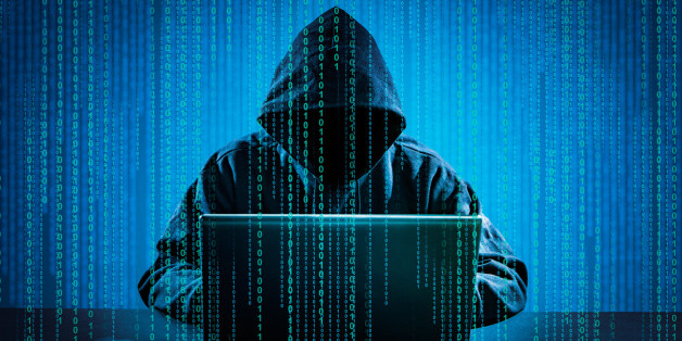 Hacker using laptop. Hacking the Internet.