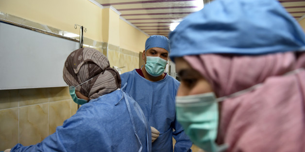 Algerian doctor Ahmed Bougroura (R), head of nephrology department at Batna's university hospital, 435 kms east of Algiers, talks to a transplanted patient on July 26, 2017.
In Algeria and across the entire Maghreb in North Africa, many people continue to suffer or die because of the lack of donors.
Part of the problem lies with laws restricting the harvesting of human organs, coupled with cultural or religious reticence, despite Muslim theologians' approval of organ donations.
/ AFP PHOTO / RYAD KRAMDI (Photo credit should read RYAD KRAMDI/AFP/Getty Images)