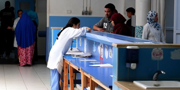 Tunisian patients arrive at the emergency room of the Charles Nicole Hospital in Tunis on May 5, 2017.
Overcrowded hospitals, exhausted staff and, disgruntled patients... Tunisia's public health sector is struggling to heal its many maladies. Hours of waiting for treatment, angry patients and broken equipment have become chronic problems.
/ AFP PHOTO / FETHI BELAID (Photo credit should read FETHI BELAID/AFP/Getty Images)