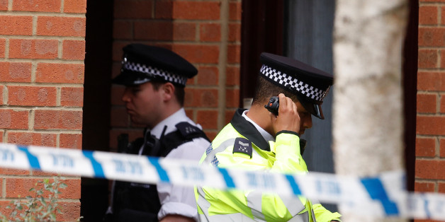 A police officer stands outside a property being searched after a man was arrested in connection with an explosion on a London Underground train, in Stanwell, near Heathrow airport, Britain, September 17, 2017. REUTERS/Peter Nicholls