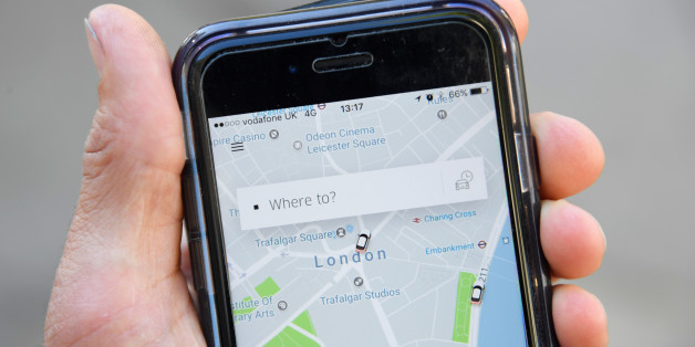 A photo illustration shows the Uber app on a mobile telephone, as it is held up for a posed photograph in central London, Britain September 22, 2017. REUTERS/Toby Melville