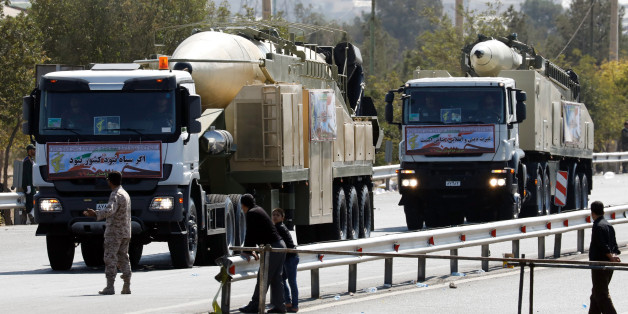 The new Iranian long range missile Khoramshahr (front) is displayed during the annual military parade marking the anniversary of the outbreak of its devastating 1980-1988 war with Saddam Hussein's Iraq, on September 22,2017 in Tehran.Rouhani vowed that Iran would boost its ballistic missile capabilities despite criticism from the United States and also France. / AFP PHOTO / str (Photo credit should read STR/AFP/Getty Images)