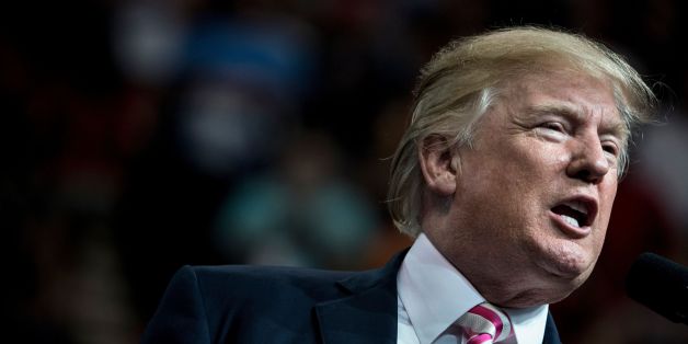 US President Donald Trump addresses a rally for Sen. Luther Strange (R-AL) at the Von Braun Civic Center September 22, 2017 in Huntsville, Alabama.Trump is visiting the southern US state to endorse Luther Strange, a candidate for US Senate in the state's Republican primary. / AFP PHOTO / Brendan Smialowski (Photo credit should read BRENDAN SMIALOWSKI/AFP/Getty Images)