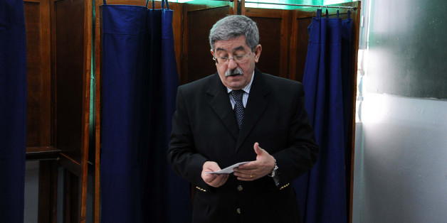 Ahmed Ouyahia se preparant a voter aux legislatives du 10 mai 2012 AFP PHOTO / FAROUK BATICHE (Photo credit should read FAROUK BATICHE/AFP/Getty Images)
