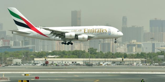 A picture take on September 14, 2017 shows an Airbus A380 of Emirates landing at the tarmac at Dubai's International Airport.
/ AFP PHOTO / GIUSEPPE CACACE (Photo credit should read GIUSEPPE CACACE/AFP/Getty Images)
