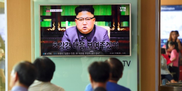 People watch a television news screen showing a picture of North Korean leader Kim Jong-Un delivering a statement in Pyongyang, at a railway station in Seoul on September 22, 2017.
US President Donald Trump is 'mentally deranged' and will 'pay dearly' for his threat to destroy North Korea, Kim Jong-Un said on September 22, as his foreign minister hinted the regime may explode a hydrogen bomb over the Pacific Ocean. / AFP PHOTO / JUNG Yeon-Je (Photo credit should read JUNG YEON-JE/AFP/Getty Images)