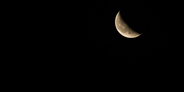 Crescent moon with dark sky background