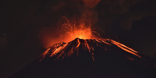 Smoke rises from the Popocatepetl as it spews incandescent volcanic material on the outskirts of Puebla, Mexico September 27, 2017. REUTERS/Oswaldo Cantero