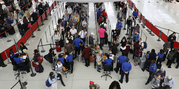 NEW YORK, NY - JUNE 05: People wait in line at John F. Kennedy International Airport (JFK) on June 5, 2017 in New York City. Part of what the White House is calling the president's 'infrastructure week,' President Donald Trump announced Monday a plan to privatize the nation's air traffic control system. If enacted, it would remove the job of tracking and guiding airplanes from the oversight of the Federal Aviation Administration. (Photo by Spencer Platt/Getty Images)