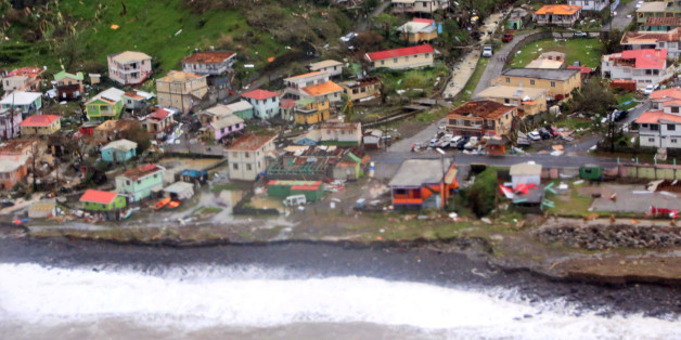 Damaged homes from Hurricane Maria are shown in this aerial photo over the island of Dominica, September 19, 2017. Photo taken September 19, 2017. Courtesy Nigel R. Browne/Caribbean Disaster Emergency Management Agency/Regional Security System/Handout via REUTERS ATTENTION EDITORS - THIS IMAGE WAS PROVIDED BY A THIRD PARTY