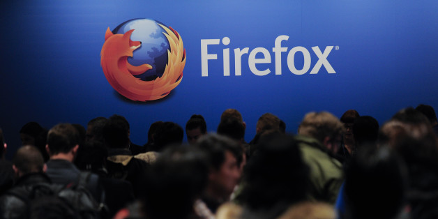People wait to attend the press conference of Mozilla's Chief Executive Officer (CEO) in Barcelona on February 24, 2013, a day before the start of the 2013 Mobile World Congress. The 2013 Mobile World Congress, the world's biggest mobile fair, is held from February 25 to February 28 in Barcelona. AFP PHOTO / JOSEP LAGO (Photo credit should read JOSEP LAGO/AFP/Getty Images)