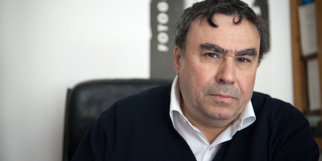 Algerian born historian and writer Benjamin Stora poses on May 6, 2010 at his home in Asnieres-sur-Seine, a Paris suburb. Stora is one of 12 intellectuals who published a text on yesterday replying to accusations of colonial history 'falsifications' in the Franco-Algerian film 'Hors-la-loi', by Rachid Bouchareb to be presented at the Cannes Film Festival this month. AFP PHOTO BERTRAND LANGLOIS (Photo credit should read BERTRAND LANGLOIS/AFP/Getty Images)