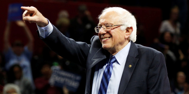 U.S. Democratic presidential candidate Bernie Sanders points and smiles at a campaign rally in New Brunswick, New Jersey, U.S., May 8, 2016. REUTERS/Dominick Reuter