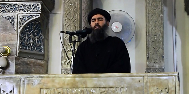 MOSUL, IRAQ - JULY 5 : An image grab taken from a video released on July 5, 2014 by Al-Furqan Media shows alleged Islamic State of Iraq and the Levant (ISIL) leader Abu Bakr al-Baghdadi preaching during Friday prayer at a mosque in Mosul.(Photo by Al-Furqan Media/Anadolu Agency/Getty Images)