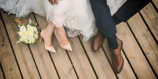 feet of bride and groom, wedding shoes (soft focus). Cross processed image for vintage lookfeet of bride and groom, wedding shoes (soft focus). Cross processed image for vintage look