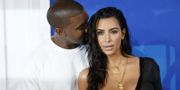 Kim Kardashian and Kanye West arrive at the 2016 MTV Video Music Awards in New York, U.S., August 28, 2016. REUTERS/Eduardo Munoz