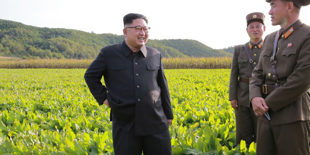 This undated picture released from North Korea's official Korean Central News Agency (KCNA) on September 30, 2017 shows North Korean leader Kim Jong-Un (L) visiting Farm No. 1116 under Korean People's Army (KPA) Unit 810 at an undisclosed location. / AFP PHOTO / KCNA VIA KNS / STR / South Korea OUT / REPUBLIC OF KOREA OUT ---EDITORS NOTE--- RESTRICTED TO EDITORIAL USE - MANDATORY CREDIT 'AFP PHOTO/KCNA VIA KNS' - NO MARKETING NO ADVERTISING CAMPAIGNS - DISTRIBUTED AS A SERVICE TO CLIENTSTHIS P