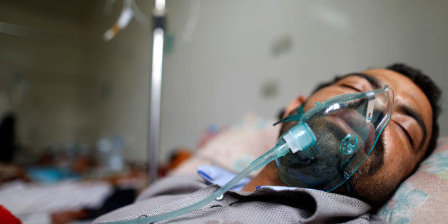 A man infected with cholera lies on a bed at a cholera treatment center in Sanaa, Yemen, May 15, 2017. REUTERS/Khaled Abdullah SEARCH "CHOLERA KHALED" FOR THIS STORY. SEARCH "WIDER IMAGE" FOR ALL STORIES.