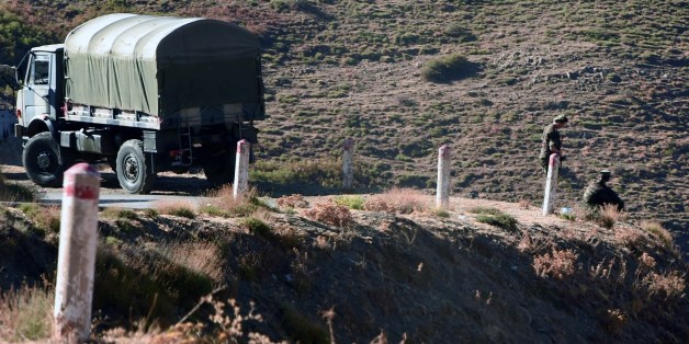 Algerian troops carry out search operations in the mountainous eastern Tizi Ouzou region in a desperate bid to find French hiker Herve Gourdel who was kidnapped by militants linked to the Islamic State group who have threatened to execute him on September 23, 2014 near the village of Ait Ouaban, 80 km south of Tizi Ouzou. Paris vowed it would not negotiate with jihadists, as the local army raced against time to find him before his threatened execution. AFP PHOTO / FAROUK BATICHE (Photo