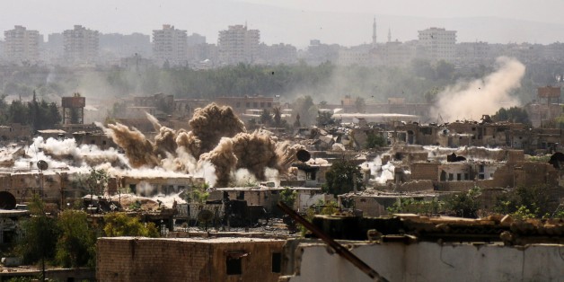 DAMASCUS, SYRIA - SEPTEMBER 29 : Smoke rises after air and ground strikes over the de-conflict zone Cobar district of Eastern Ghouta, in Damascus, Syria on September 29, 2017. (Photo by Ammar Al-Bushy/Anadolu Agency/Getty Images)