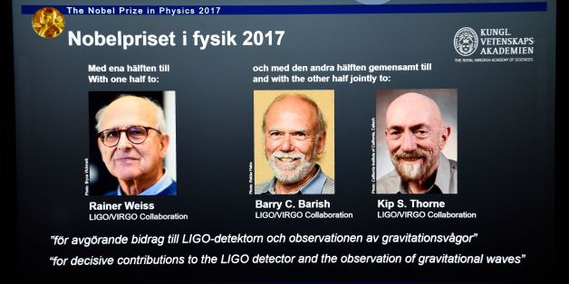 Laureates (L-R) Rainer Weiss, Barry C Barish and Kip S Thorne are pictured on a display during the announcement of the 2017 Nobel Prize winners in Physics on October 3, 2017, at the Royal Swedish Academy of Sciences in Stockholm. / AFP PHOTO / Jonathan NACKSTRAND (Photo credit should read JONATHAN NACKSTRAND/AFP/Getty Images)