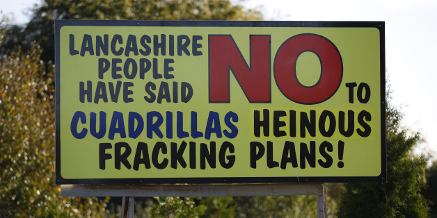 An anti fracking sign stands on the road near the village of Little Plumpton, northern England, October 6, 2016. The British government approved a new shale gas fracking permit on Thursday, overruling a local authority decision and boosting Britain's position as Europe's most promising shale gas exploration ground. REUTERS/Phil Noble