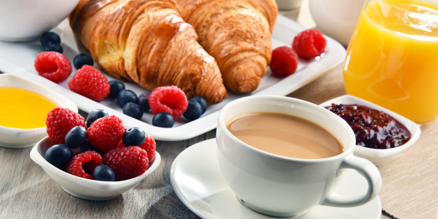 Breakfast served with coffee, orange juice, croissants, cereals and fruits. Balanced diet.