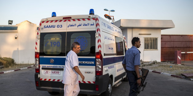 An ambulance carrying British tourists, who were wounded during the Imperial Marhaba hotel attack by a gunman, arrive to board the Royal Air Force (RAF) jet at Monastir airport, Tunisia, June 29, 2015. Hundreds of armed police patrolled the streets of Tunisia's beach resorts on Sunday and the government said it will deploy hundreds more inside hotels after the Islamist militant attack in Sousse that killed 39 foreigners, mostly Britons.REUTERS/Zohra Bensemra