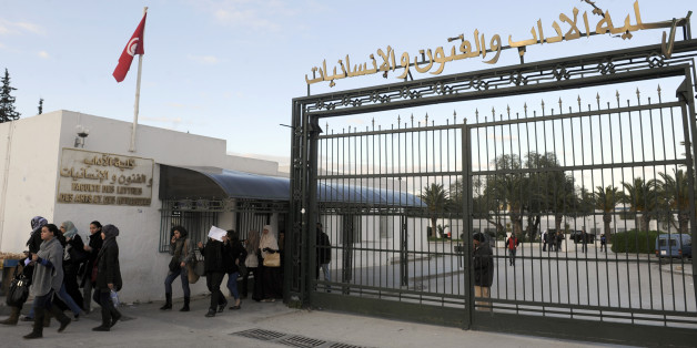 Students of the Faculty of Arts and letters in Manuba leave the campus on January 18, 2012 in Tunis. Four students wearing niqab started a hunger strike on January 17 as they demand to wear it during classes and exams. A group of Salafists disrupted classes on November 28, 2011 at the university, demanding to stop mixed-sex classes and for female students to wear full face veils. AFP PHOTO/ FETHI BELAID (Photo credit should read FETHI BELAID/AFP/Getty Images)