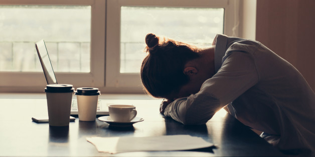 Tired businesswoman in the office