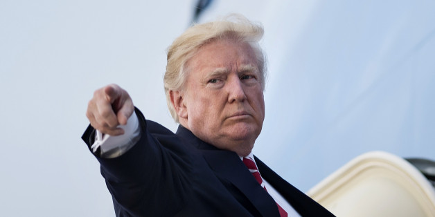 US President Donald Trump boards Air Force One at Andrews Air Force Base on October 7, 2017 in Maryland.Trump is traveling to North Carolina. / AFP PHOTO / Brendan Smialowski (Photo credit should read BRENDAN SMIALOWSKI/AFP/Getty Images)
