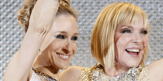 Cast members Sarah Jessica Parker (L) and Kim Cattrall attend the Japan premiere of "Sex and the City 2" in Tokyo June 1, 2010. REUTERS/Michael Caronna (JAPAN - Tags: ENTERTAINMENT)