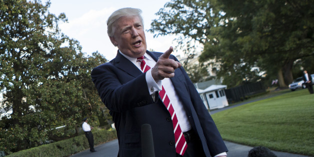US President Donald Trump speaks with reporters outside the White House prior to his departure aboard Marine One on October 7, 2017. During the exchange, President Trump called NBC News, 'Fake News' after the news agency reported tension between Trump and US Secretary of State Rex Rex Tillerson. The President will travel to Greensboro, North Carolina this evening to participate in a roundtable discussion with Republican National Committee members. / AFP PHOTO / Alex EDELMAN (Photo credit