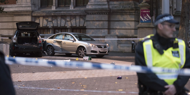 Police Officers and emergency workers are pictured on the site of a car crash outside the Natural History Museum at South Kensington, London on October 7, 2017. A car mounted the pavement outside the Natural History Museum in Exhibition Road, South Kensington, injuring 11 people. 9 people were taken to hospital. (Photo by Alberto Pezzali/NurPhoto via Getty Images)
