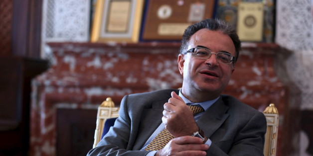 Tunisia's Finance Minister Slim Chaker gestures as he speaks with Reuters journalists in Tunis, Tunisia, October 26, 2015. Tunisia, frustrated by the international community's failure to deliver on pledges of economic support, is asking the Group of Eight major nations for a five-year rescue programme worth $25 billion. Chaker told a Reuters the billions of dollars of aid were needed to ensure Tunisia's political progress was not reversed. Picture taken October 26, 2015. REUTERS/Zoubeir Souissi