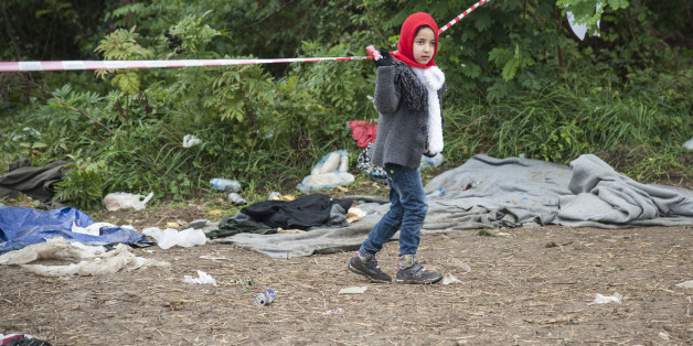 SERBIAN-CROATIAN BORDER, BAPSKA, SYRMIA, CROATIA - 2015/09/23: A child on the path leading to the Serbian-Croatian border. More refugees continue to arrive in Europe due to persecution and poverty in their homeland. (Photo by Ivan Romano/Pacific Press/LightRocket via Getty Images)