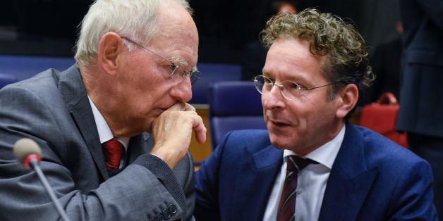 German Finance Minister Wolfgang Schaeuble (L) talks with Dutch Finance Minister and President of the Eurogroup, Jeroen Dijsselbloem during a Eurozone Finance ministers meeting in Luxembourg on October 9, 2017.
German Finance Minister Wolfgang Schaeuble, the warhorse of the debt crisis, attends his final meeting of eurozone ministers on October 9 as variously the most loathed or loved figures in EU politics. / AFP PHOTO / JOHN THYS (Photo credit should read JOHN THYS/AFP/Getty Images)