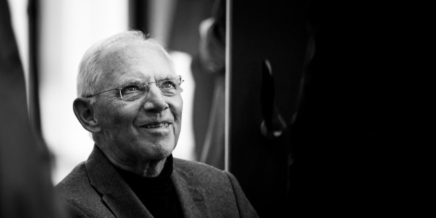 (EDITORS NOTE: Image has been converted to black and white.) BERLIN, GERMANY - SEPTEMBER 26: German Finance Minister Wolfgang Schaeuble, arrives for a joint meeting of the Bundestag parliamentarians of the CDU and its Bavarian sister party, the CSU, on September 26, 2017 in Berlin, Germany. Today's is the first meeting since German federal elections two days ago, in which the CDU won, though with 8.6% points fewer than in 2013. The CDU and CSU are now tasked with creating a new government coalition, which will most likely be with the Free Democratic Party (FDP) and the German Greens Party (Buendnis 90/Die Gruenen), though negotations will lieky be rocky. September 26, 2017 in Berlin, Germany. (Photo by Florian Gaertner/Photothek via Getty Images)