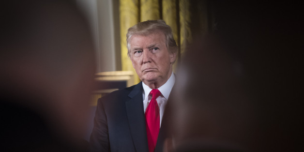 WASHINGTON, DC - JULY 31: President Donald Trump stands with retired Army medic James McCloughan before bestowing the nation's highest military honor, the Medal of Honor, to him at a ceremony in the East Room of the White House in Washington, DC on Monday, July 31, 2017. (Photo by Jabin Botsford/The Washington Post via Getty Images)