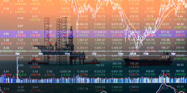 Stock market concept with oil rig in the gulf and oil refinery industry background,Double exposure