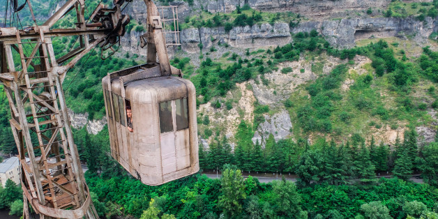 CHIATURA, GEORGIA - JUNE 2014:The cable car network spans 6,000 meters in, Chiatura, Georgia, June 2014.
THE morning commute is stressful for most, but have sympathy for the residents of a small mining town who have to travel in rusted cable cars that are more than 60 years old. Located in the town of Chiatura, Georgia, you would be forgiven for thinking you have been teleported back to the Cold War period. Built in the 1950s by the Soviet Union to transport workers around the mining town quicker the cable cars transport visitors to a by gone era. Photographer Ioanna Sakellaraki, 26, travelled to the old mining town to snap one of the worlds longest cable car networks which boasts 17 functioning cabins and car lines that span more than 6,000 metres (3.7 miles).
PHOTOGRAPH BY Ioanna Sakellaraki / Barcroft Images
London-T:+44 207 033 1031 E:hello@barcroftmedia.com -
New York-T:+1 212 796 2458 E:hello@barcroftusa.com -
New Delhi-T:+91 11 4053 2429 E:hello@barcroftindia.com www.barcroftimages.com (Photo credit should read Ioanna Sakellaraki / Barcroft Im / Barcroft Media via Getty Images)