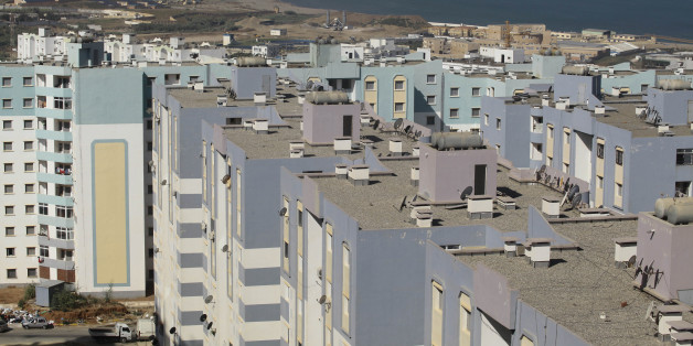 A general view shows newly constructed residential buildings in Ain Benian on the outskirts of the Algerian capital Algiers, July 8, 2013. Political and social pressures are combining to open Algeria's construction market to international competition, potentially making billion of dollars worth of contracts available to foreign companies. Housing supply has long been a source of public discontent in Algeria, which has a young and growing population of 37 million. Migration to the cities has pack