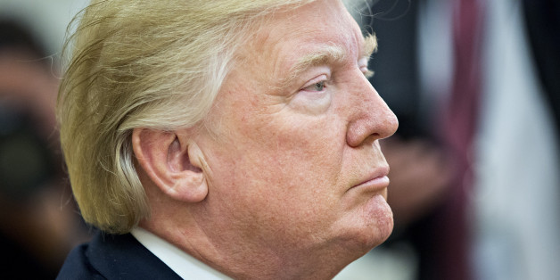 U.S. President Donald Trump listens as Henry Kissinger, former U.S. secretary of state, not pictured, speaks during a meeting in the Oval Office of the White House in Washington, D.C., U.S., on Tuesday, Oct. 10, 2017. During the meeting Trump said he plans to make changes to his tax plan within the next few weeks. Photographer: Andrew Harrer/Bloomberg via Getty Images